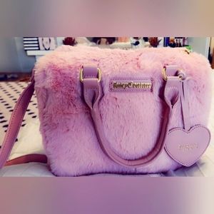 Brand new Pink fur juicy couture purse!!! Have a couple in my page!!